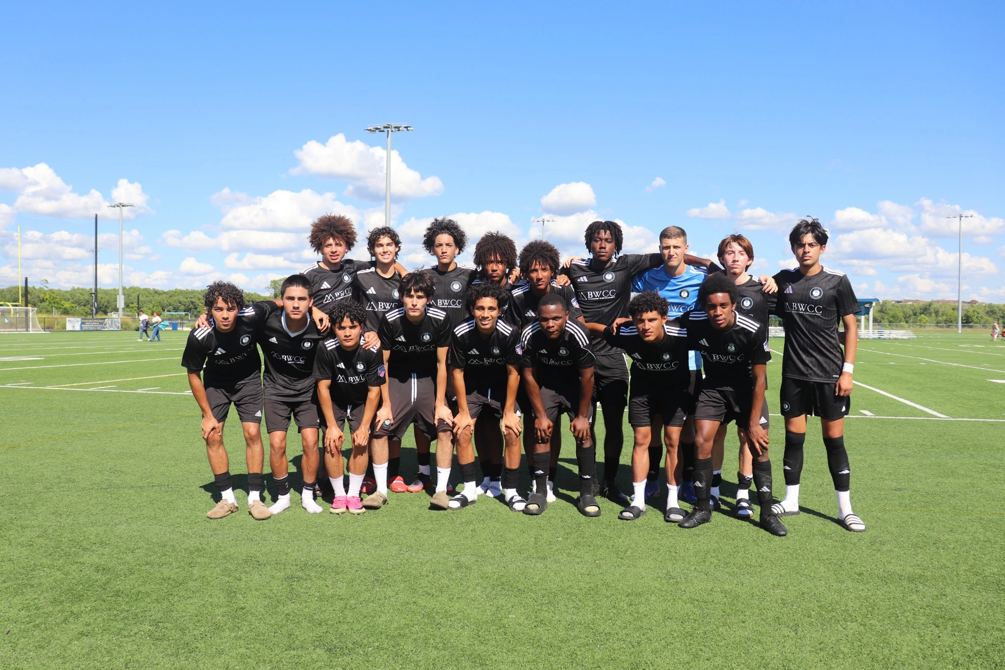 LASE LIONS U19 team in black club uniforms