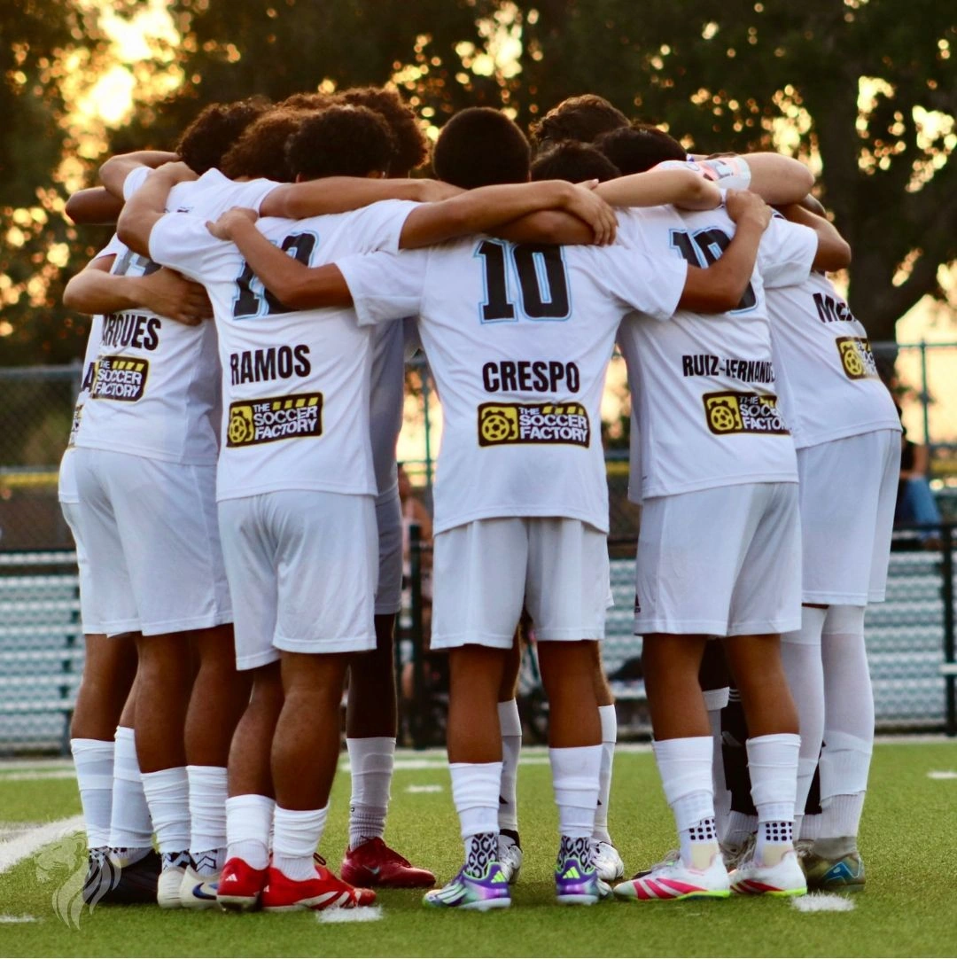 LASE LIONS men’s team in a matchday huddle