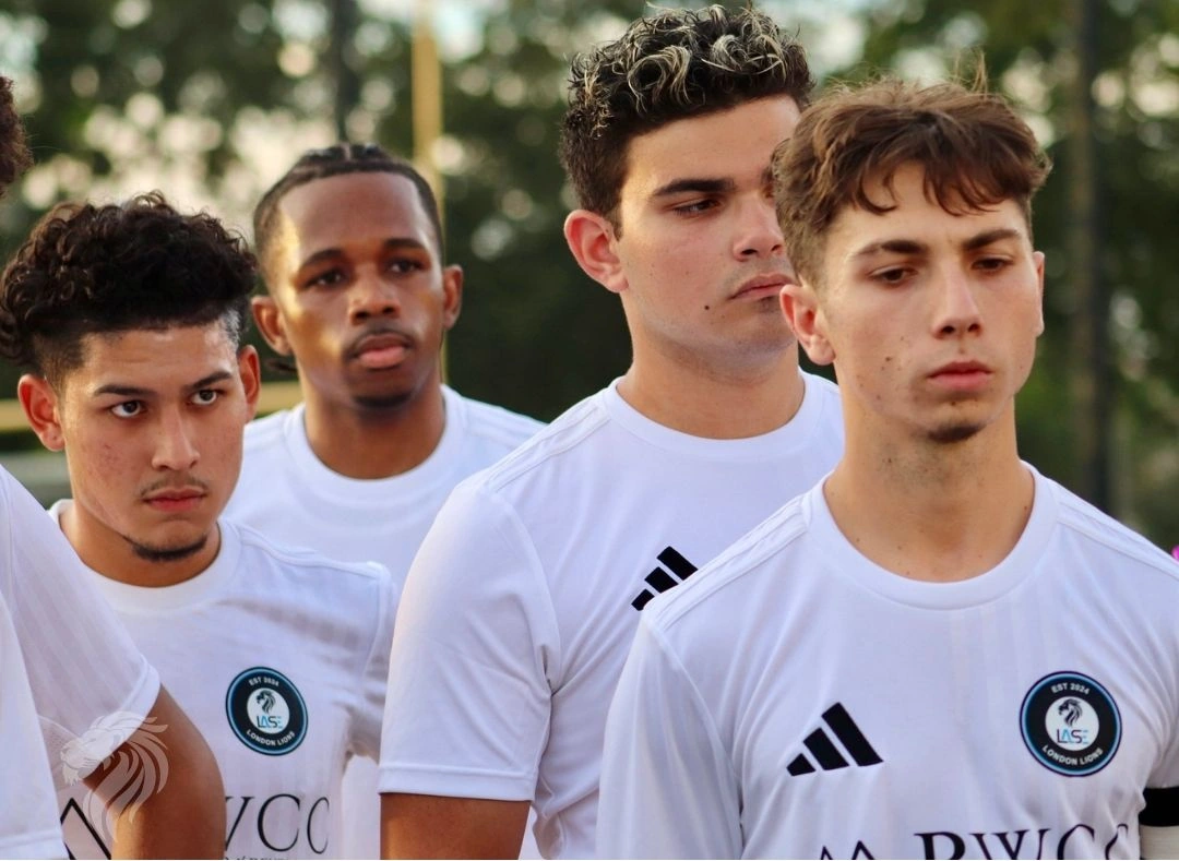 LASE LIONS players in their white club uniforms